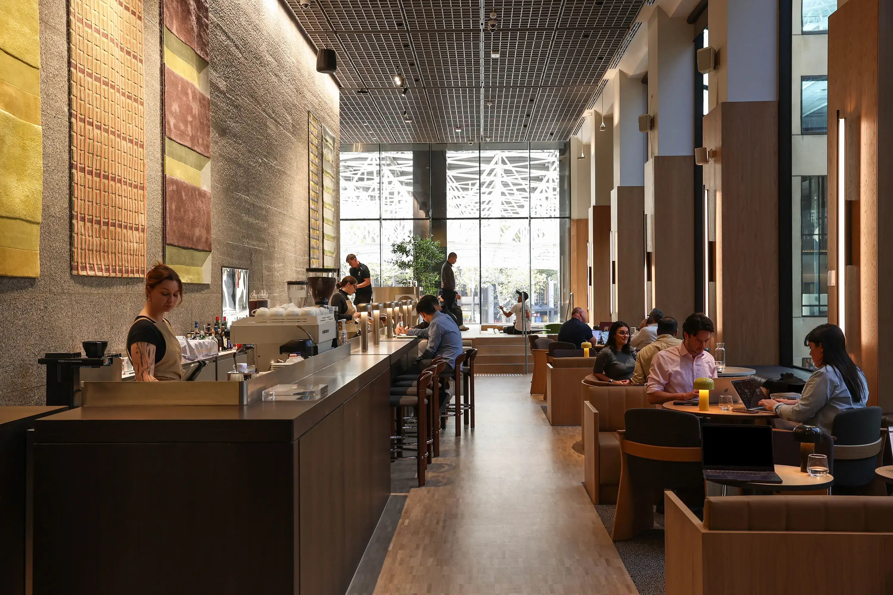 People working and meeting in a spacious commercial building