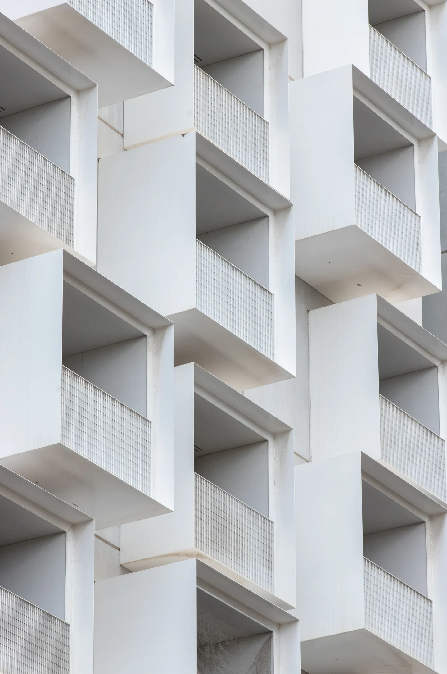 White geometric apartment balconies in Melbourne, Australia