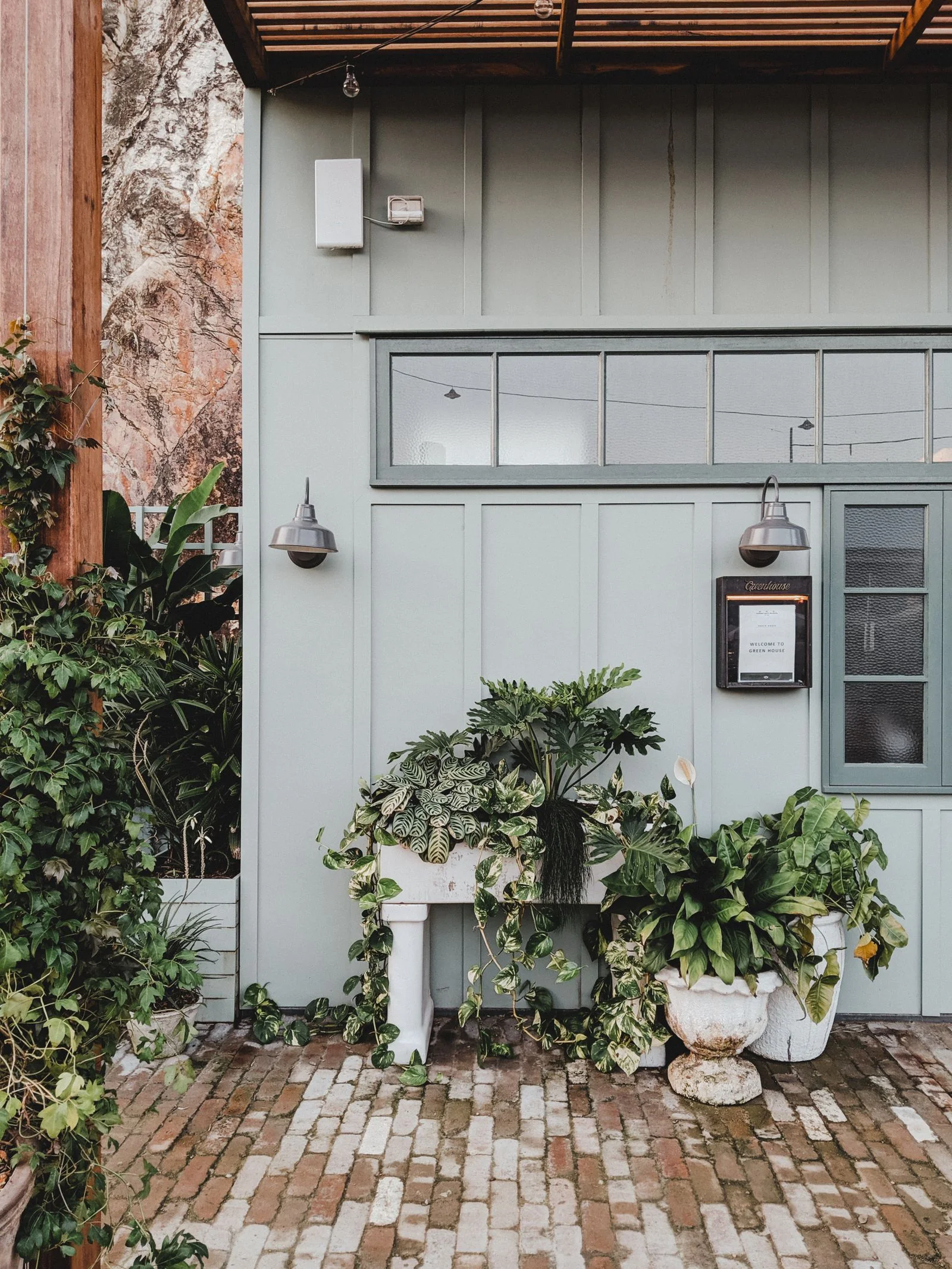 A house entrance surrounded by garden plants in Brisbane