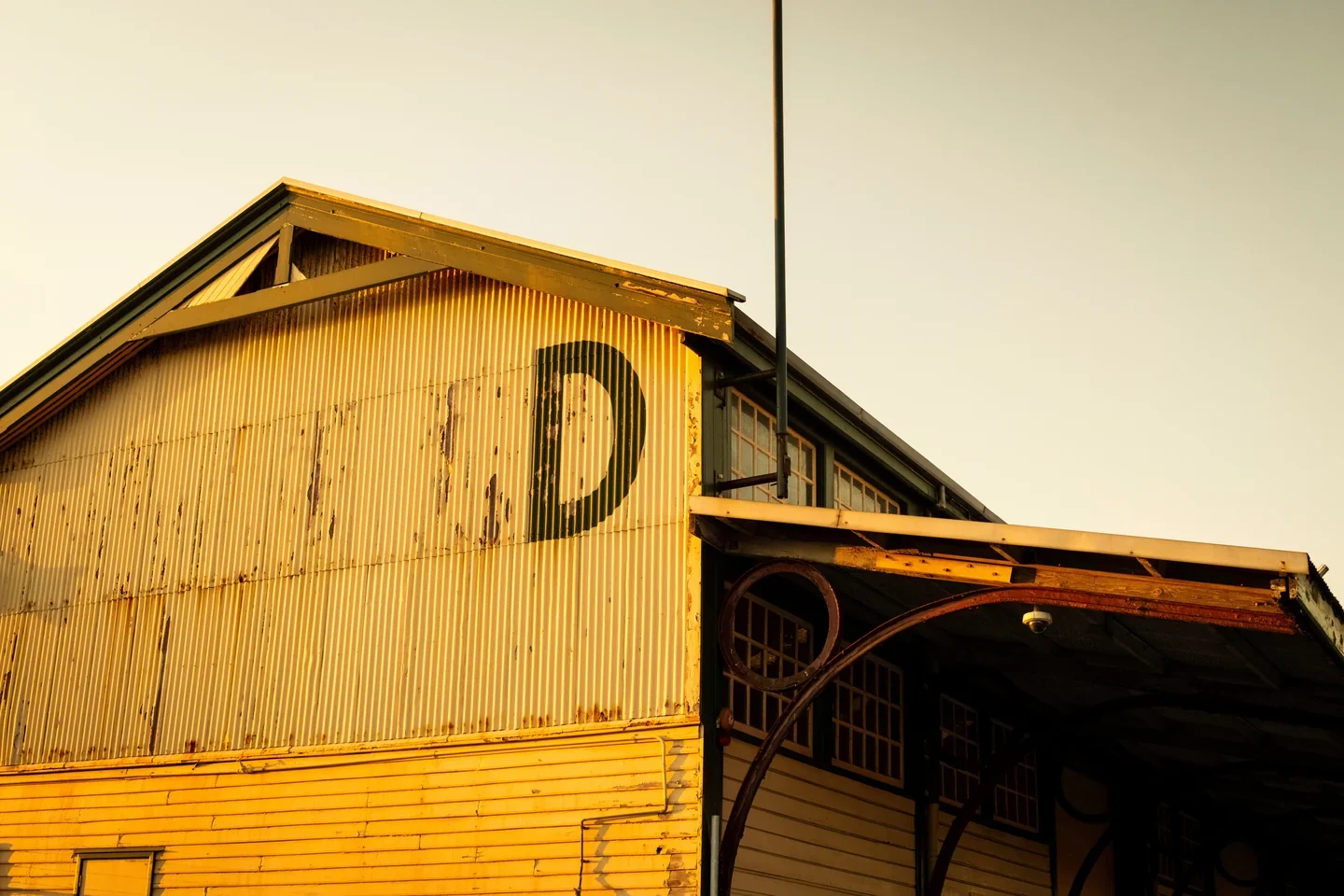 A corrugated industrial building in Fremantle in sunlight